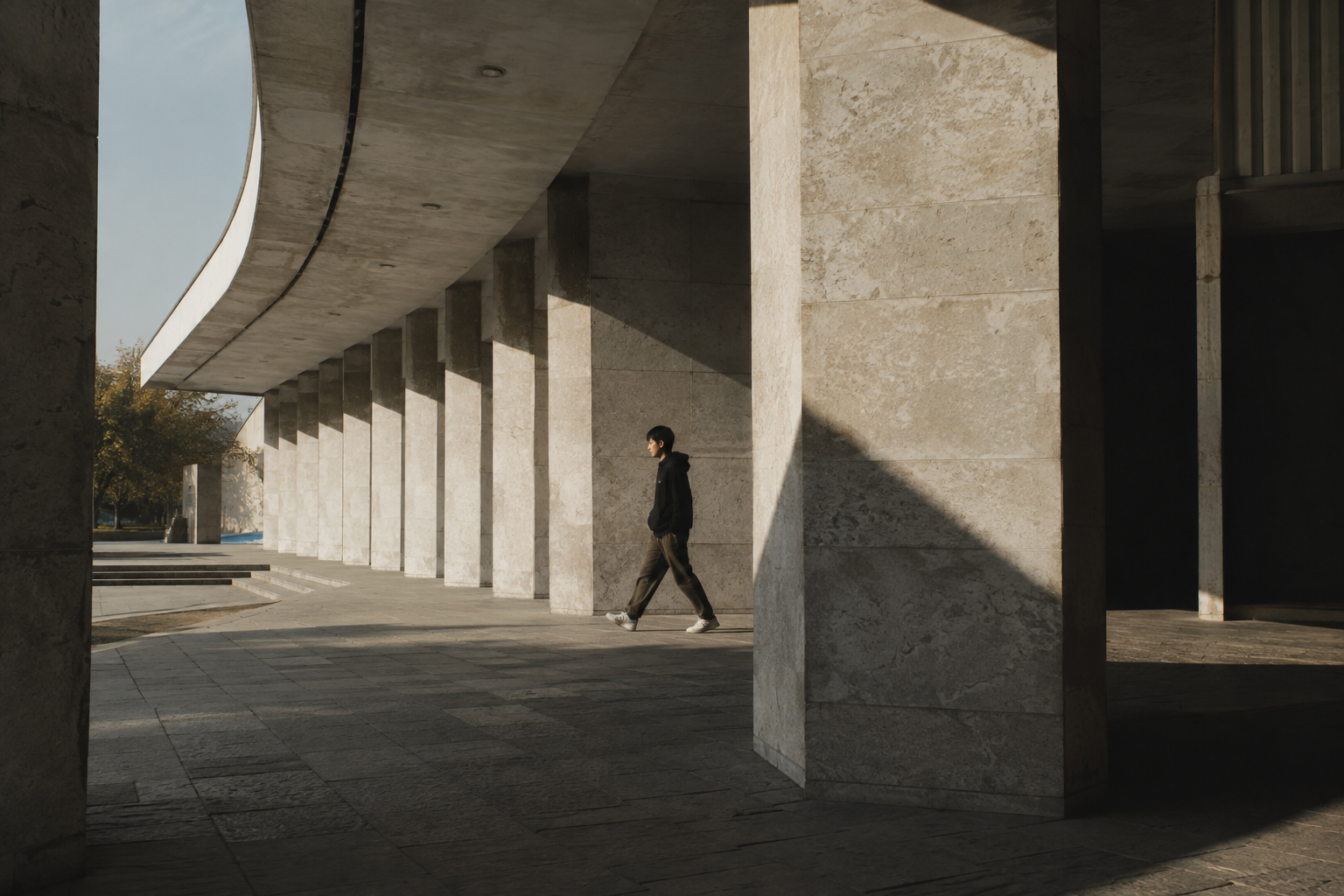 Soviet modernist rhythm and hard side light in Almaty.